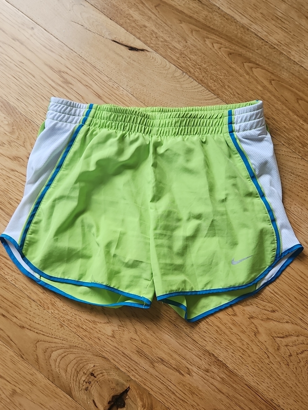 Nike Women's Neon Green Athletic Shorts with White Panels and Blue Trim